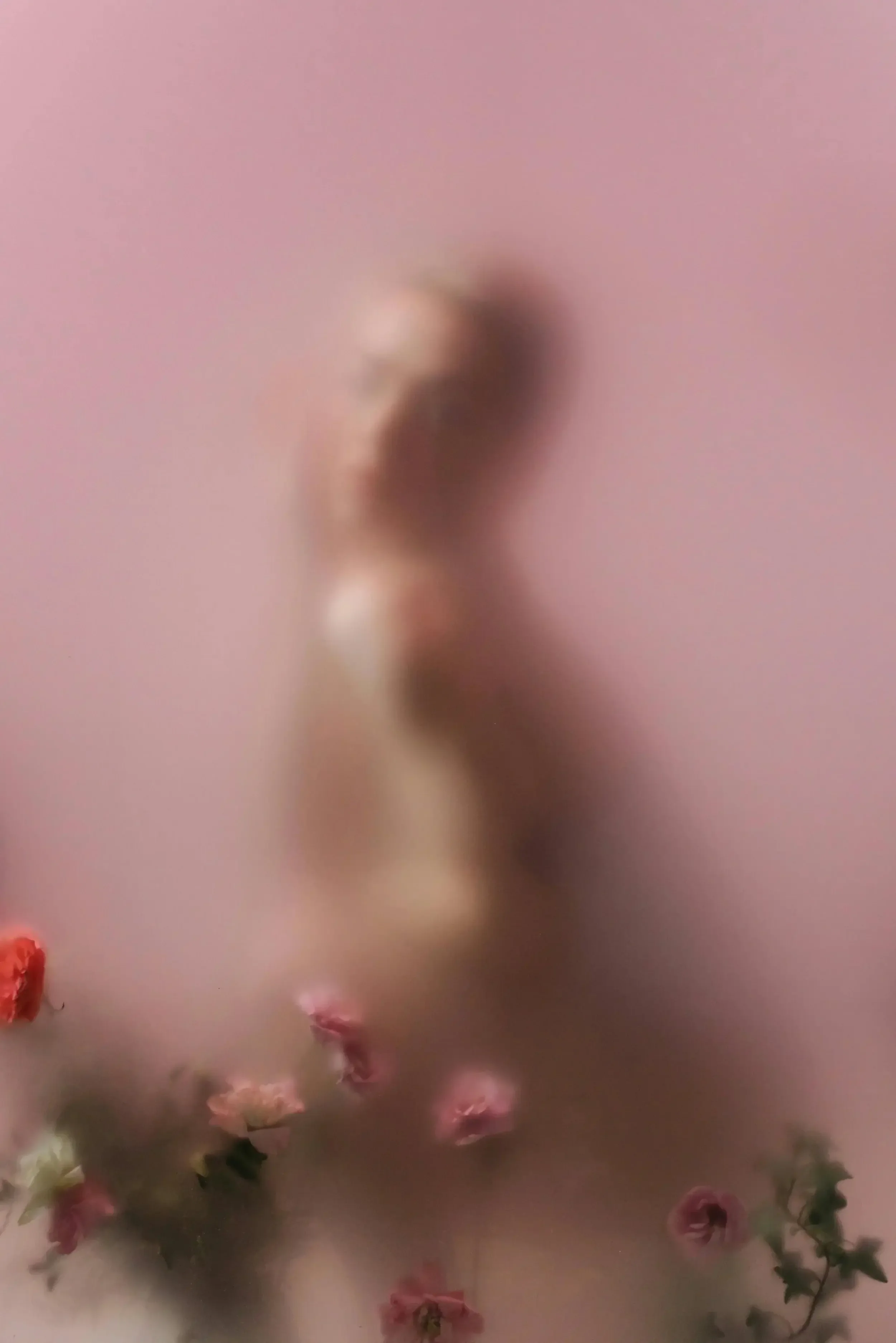 A blurred image of a woman