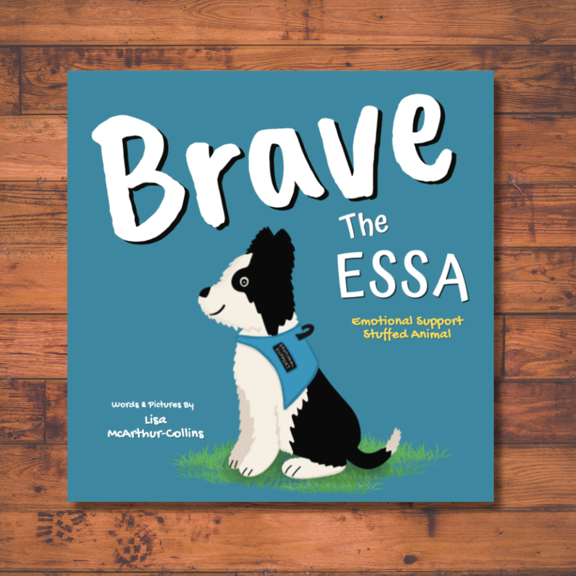 Book cover titled "Brave the ESSA" featuring a cartoon black and white dog with a blue support harness, sitting on grass.