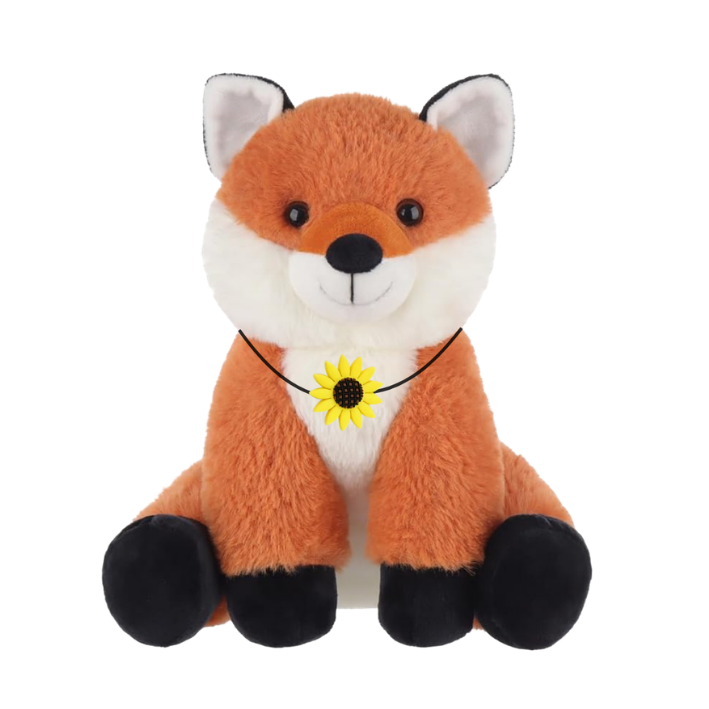 A plush fox toy with a sunflower necklace, sitting with black paws and a smiling face.