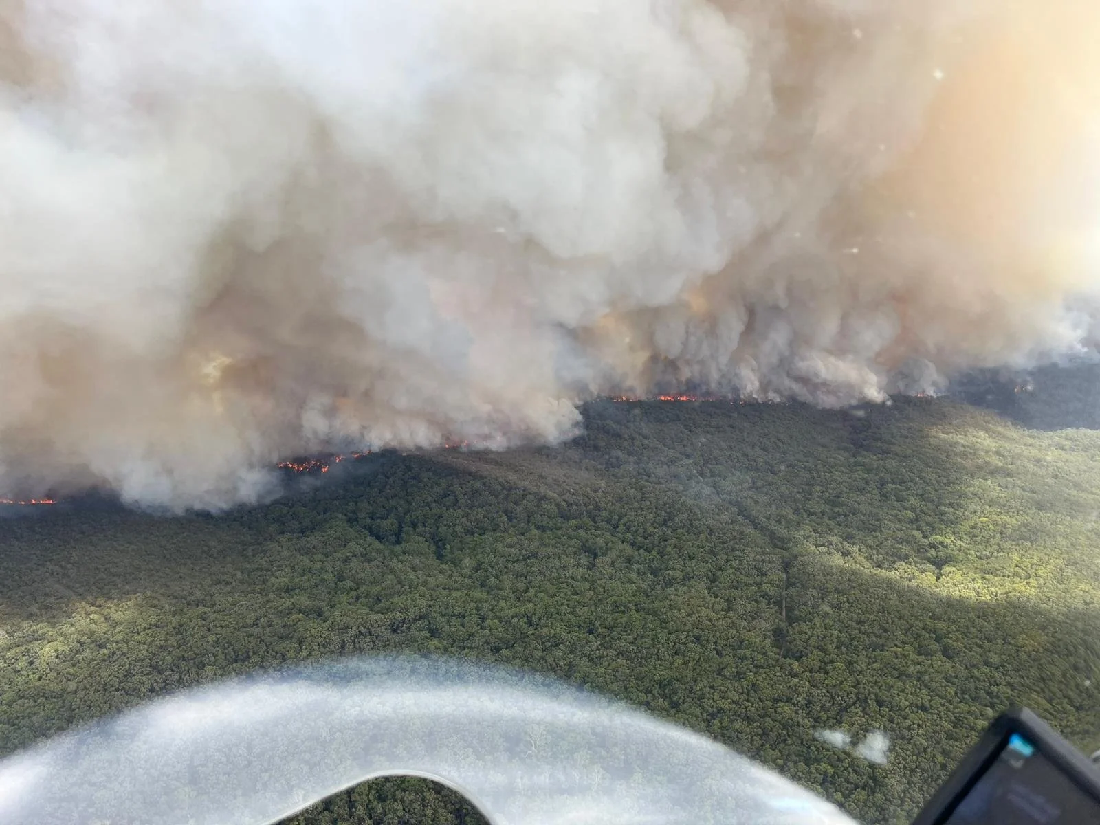 Contract aerial firefighting pilot supporting emergency response operations