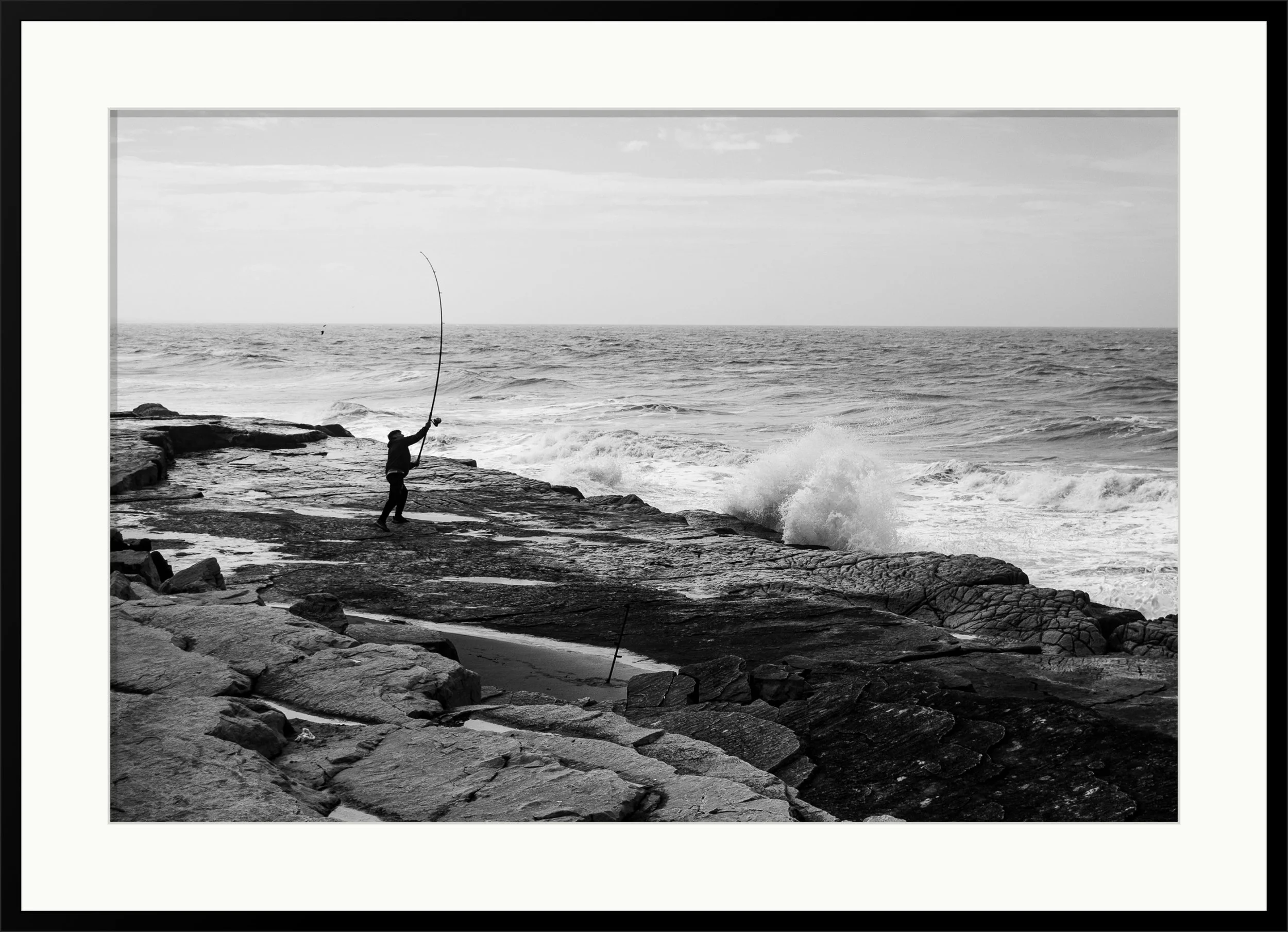 Fisherman on the rocks
