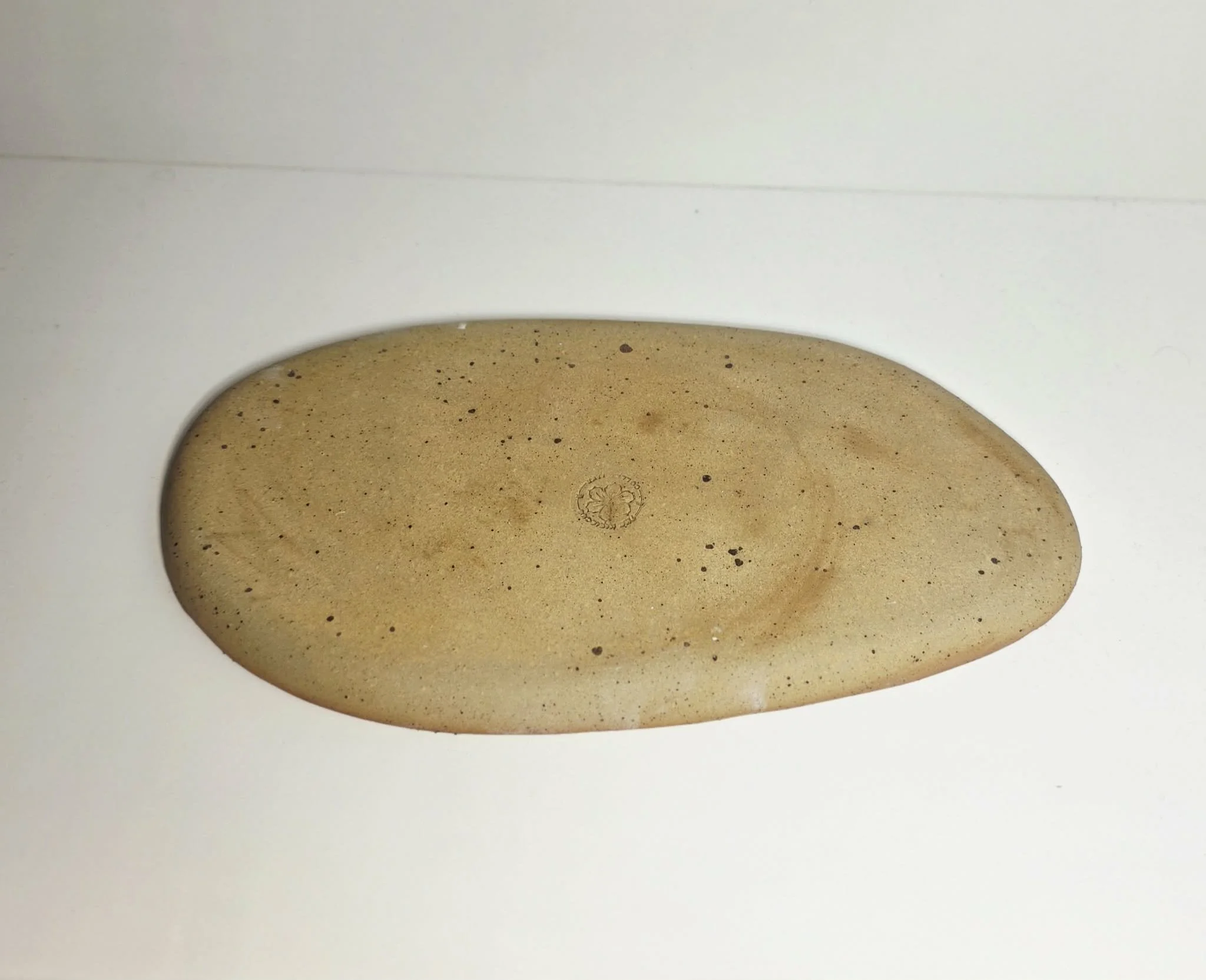 Oval palm plate large base.jpeg