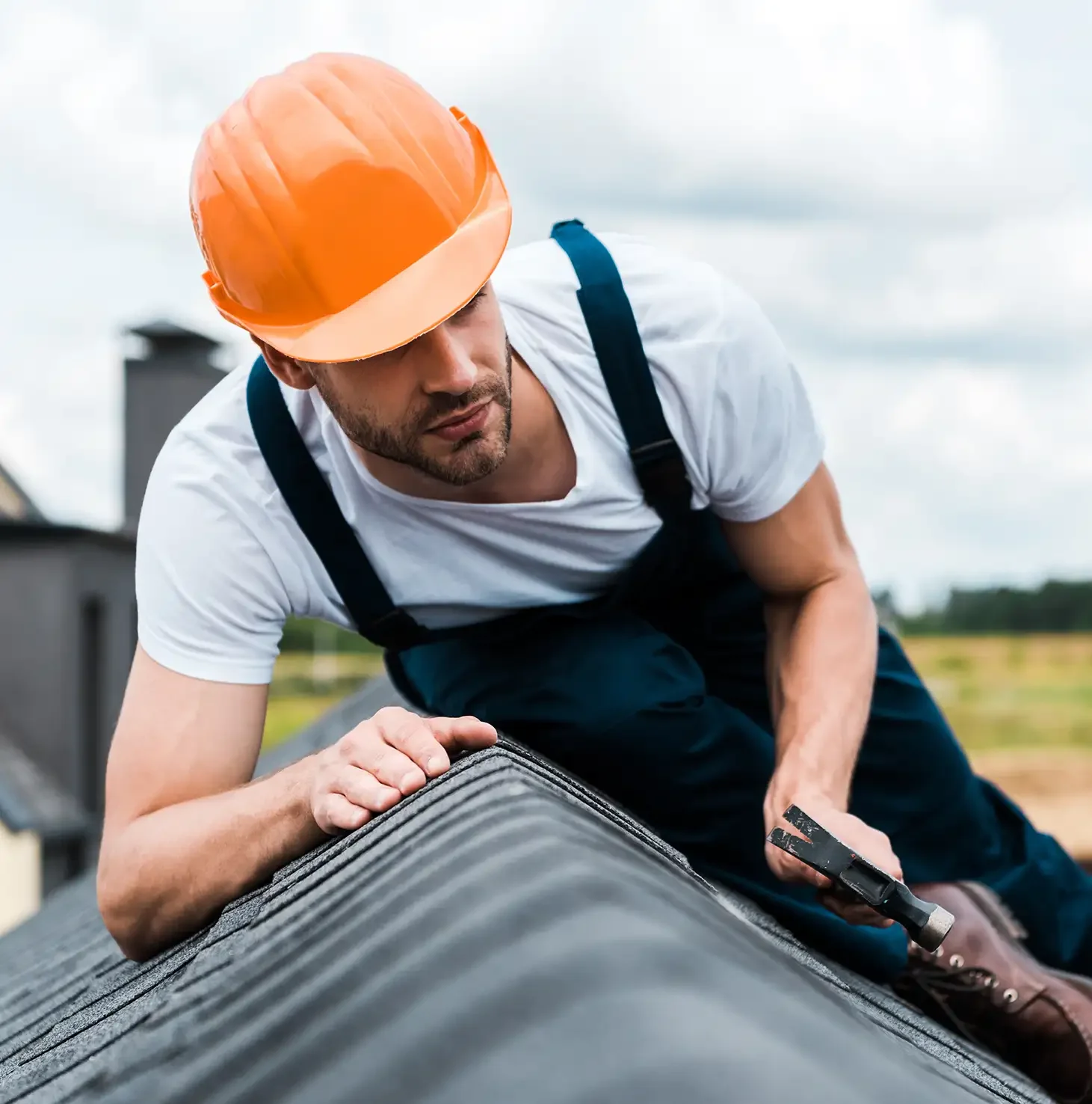 Professional roofing crew member providing a free roof estimate in North and East Texas for Legion Roofing USA.