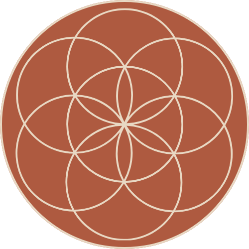 Close-up of a geometric pattern featuring interlocking circles on a brown background.