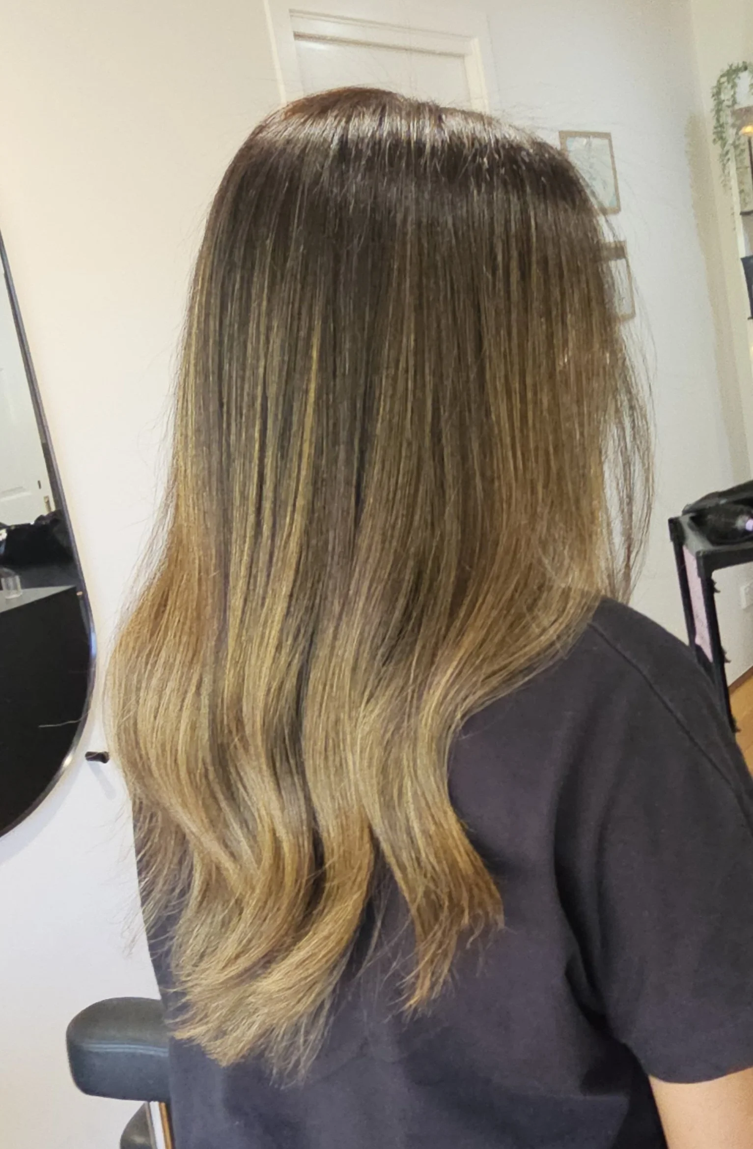After photo of blonde balayage and soft waves created at Jazz Up Your Hair in Eagle Vale Sydney.