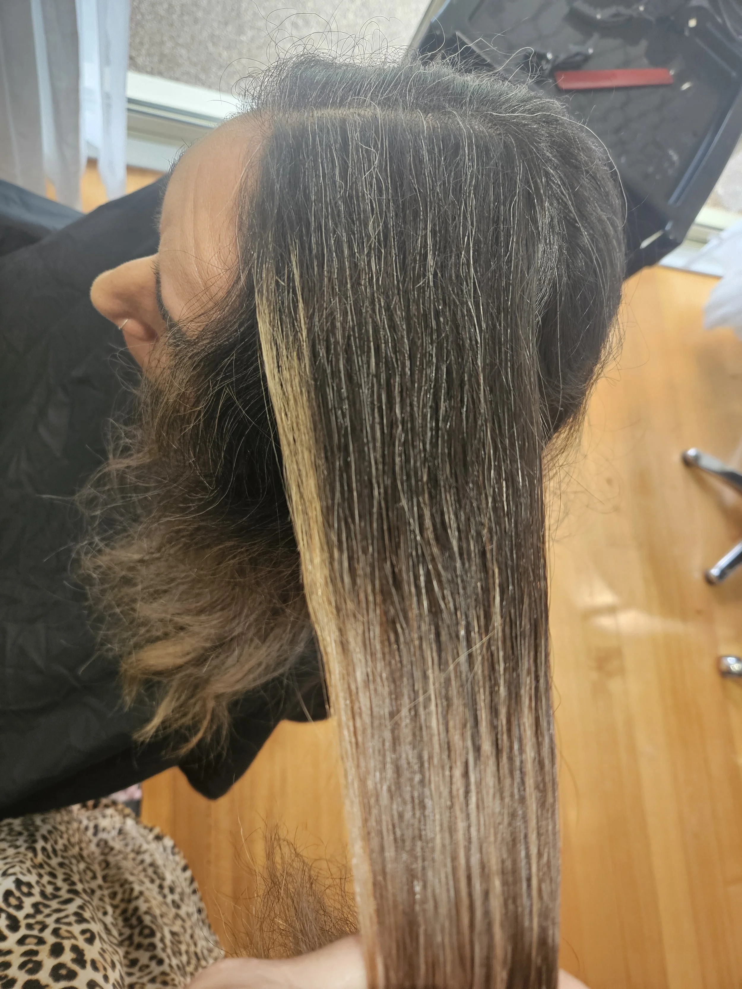 Before photo showing hair regrowth before colour correction at Jazz Up Your Hair in Eagle Vale Sydney.