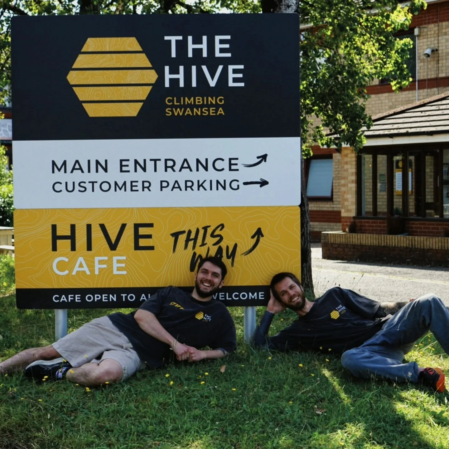 Two men, one sign, several weeks of hard graft &mdash; and a well-earned lie down 😅 
Signage's up, staff tshirts have landed, and The Hive is officially running smoothly. 
Massive thanks to Tom &amp; Ryan (not forgetting Josh too!) for making it hap