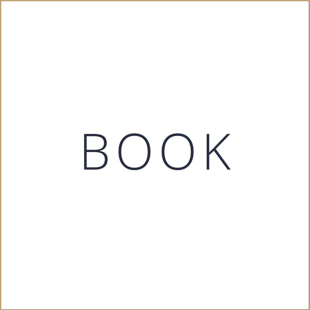 Plain white background with the word "BOOK" centered in dark blue capital letters.