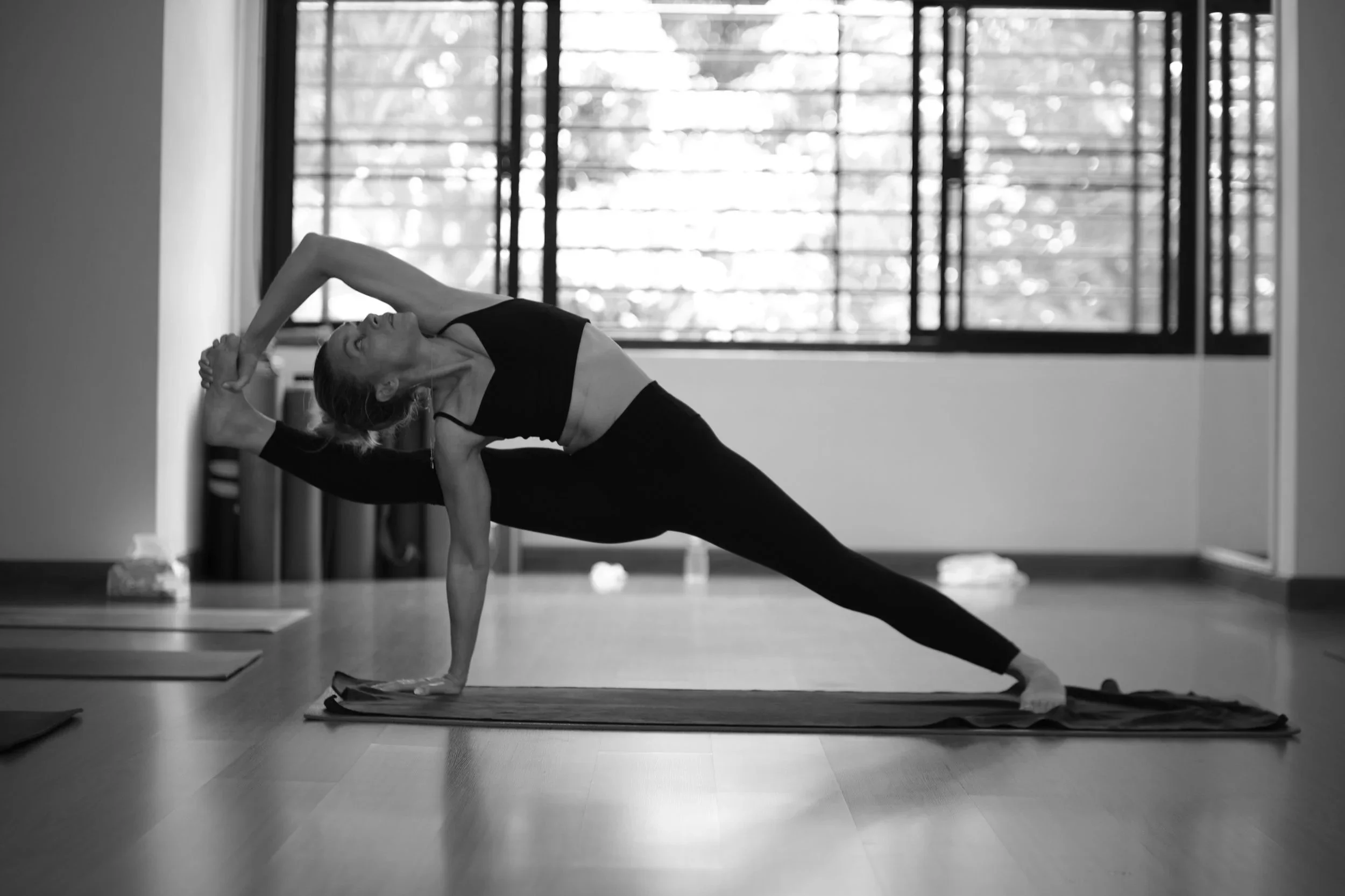 Woman in Yoga pose Yoga for Mortals, a yoga studio in Leigh-on-Sea, Essex.