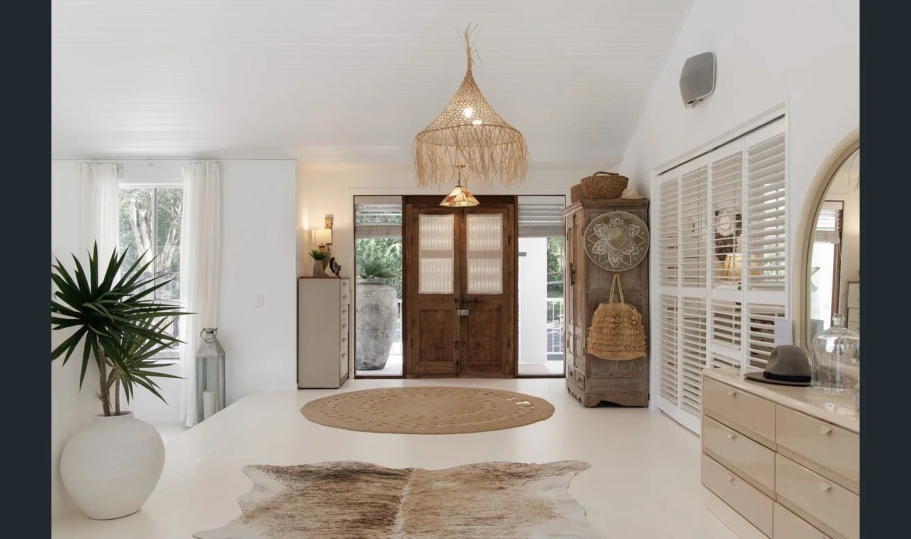 Boutique holiday accommodation styling with natural, elevated interiors