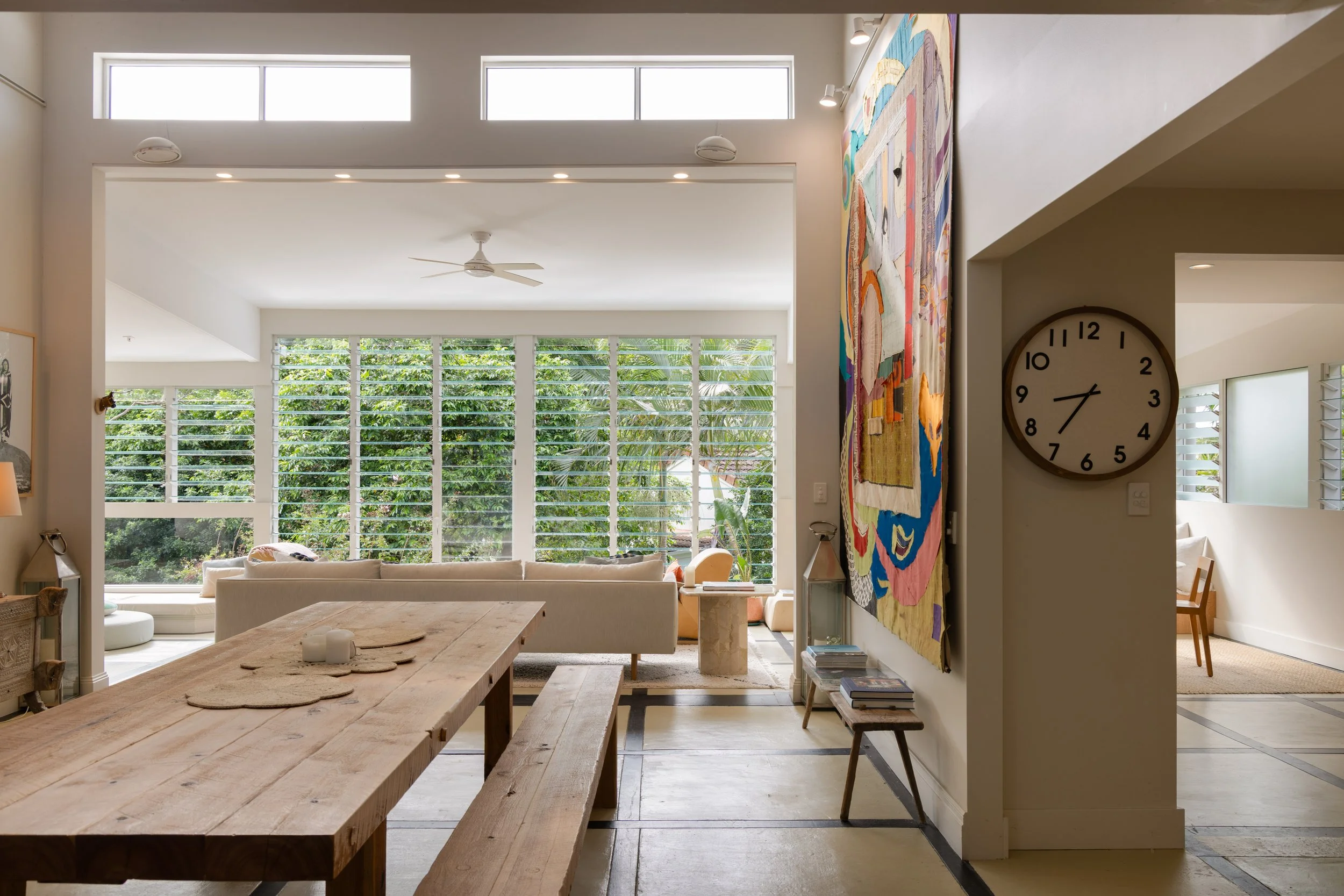 Renovated Airbnb living room on the Sunshine Coast designed to enhance guest experience through natural light and indoor-outdoor flow.
