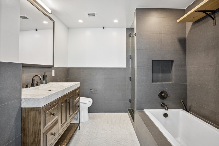 06_446KentAvenue12D_13_PrimaryBathroom_LowRes.jpg