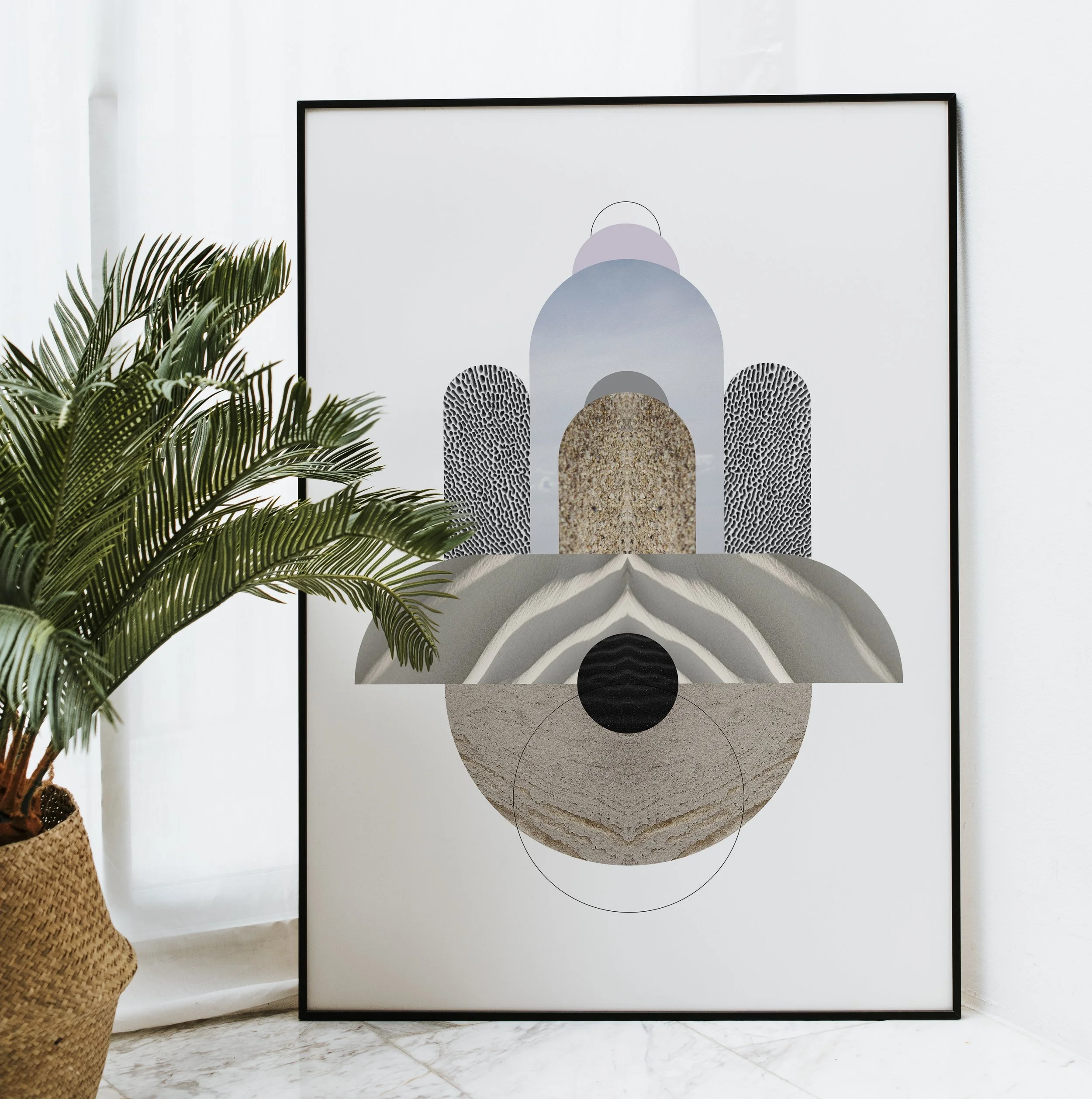 Abstract geometric art with arches and circles in neutral tones, leaning against a white wall, next to a potted green palm plant.
