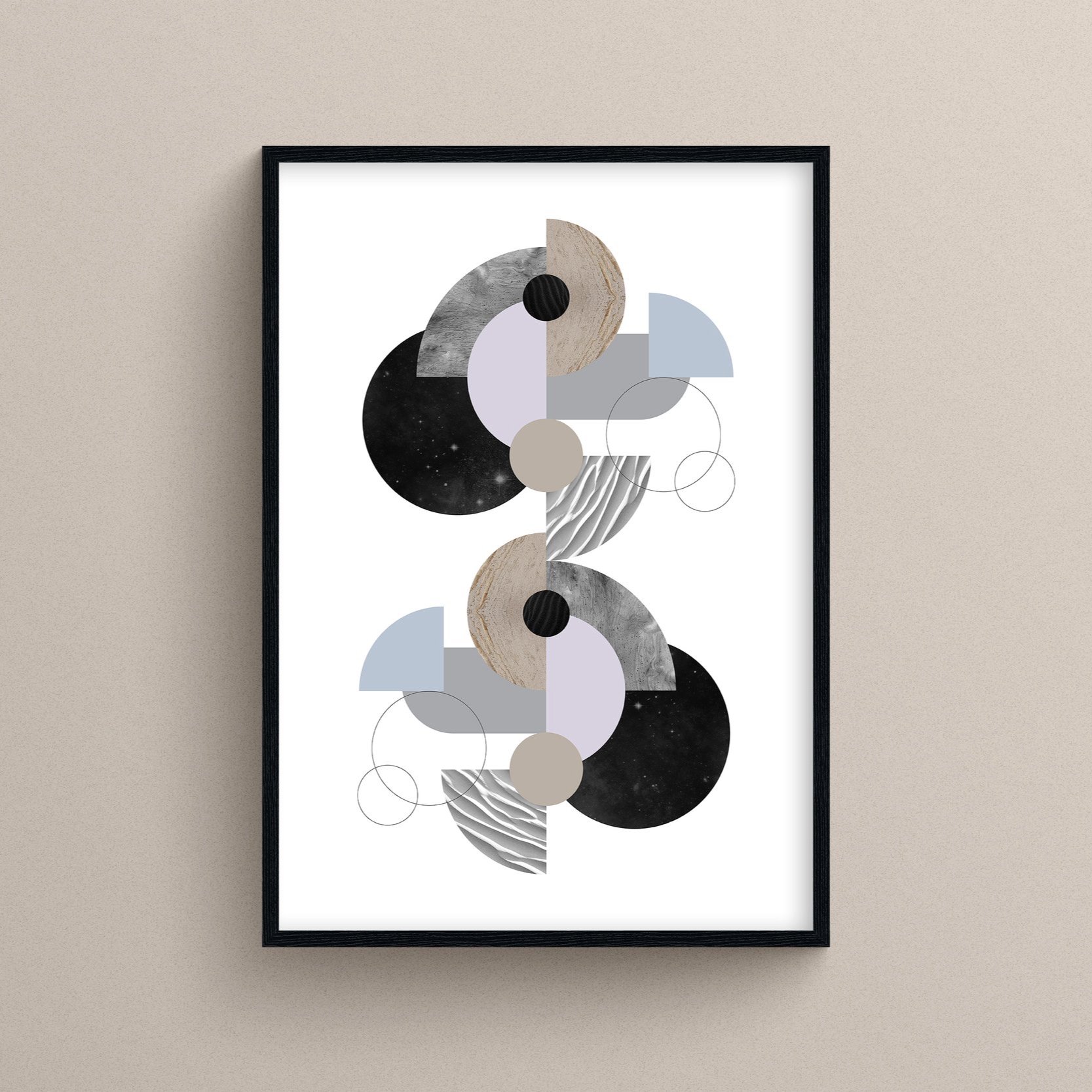Abstract geometric art print featuring circles, semi-circles, and overlapping shapes in black, gray, beige, and pastel blue, framed in black, hanging on a beige wall.