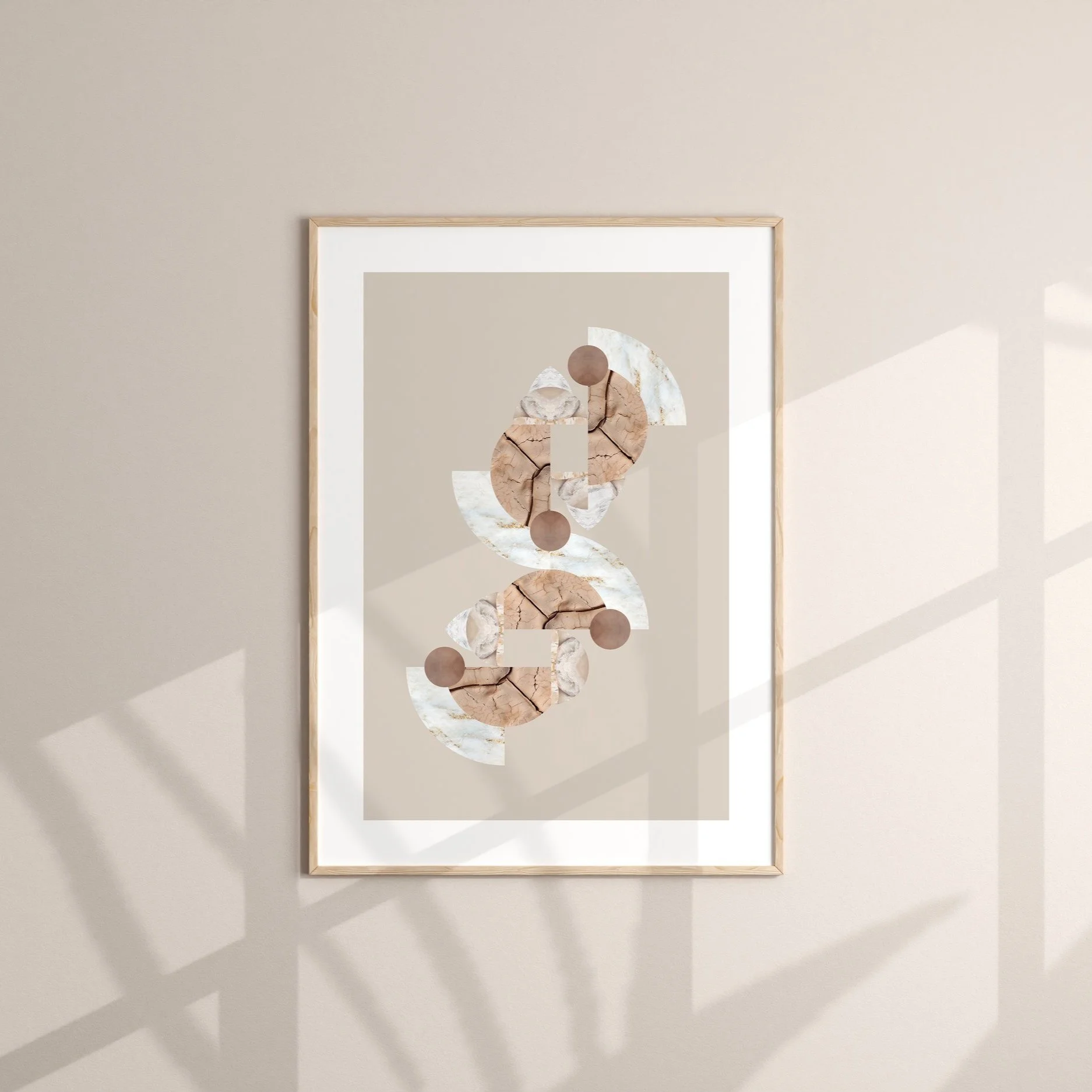 Abstract wall art featuring geometric shapes in beige, brown, and white tones with shadows cast on a beige wall.