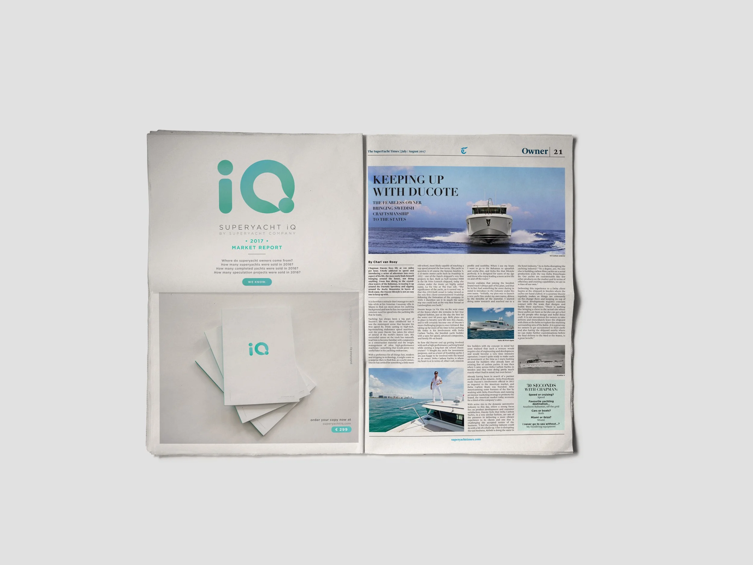 A collection of yacht-related magazines and brochures, including a SuperYacht IQ market report and a publication with a boat on the cover, displayed on a white surface. Designed by Eszter Takacs, graphic designer.