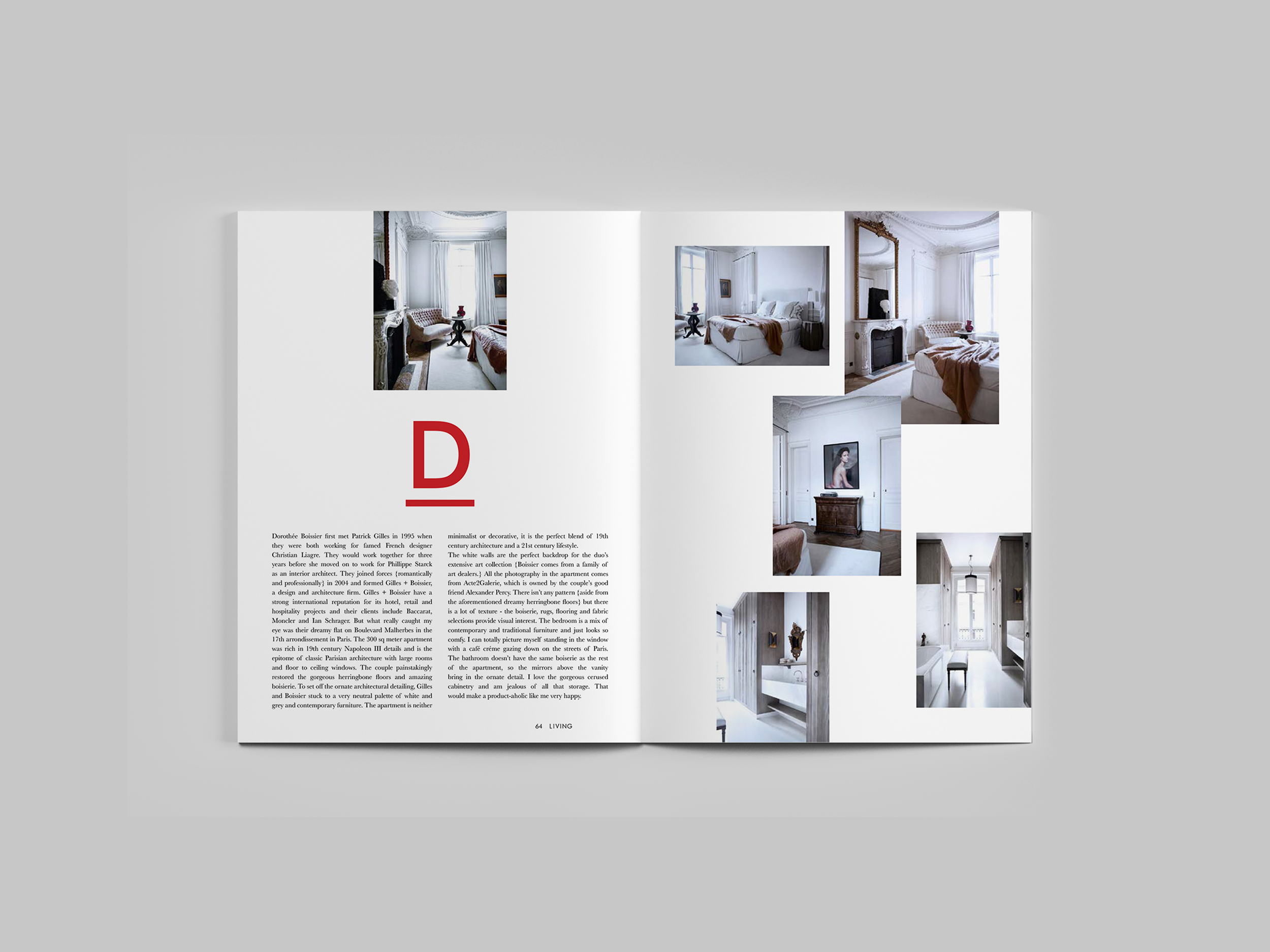 Open magazine spread showing interior decor of a classic, elegant bedroom with white walls, vintage furniture, and large windows.