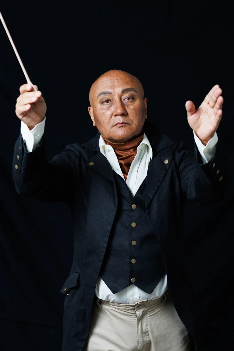 Conductor leading live music