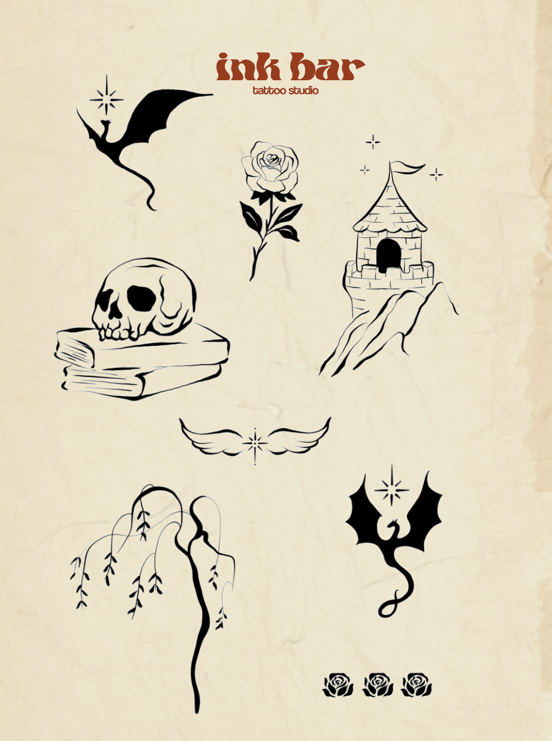 Collection of black tattoo-style line drawings including a bat, a rose, a castle on a mountain, a skull on books, a wing, a leafless tree, a dragon with a bat-like body, and three roses at the bottom, with the text 'ink bar tattoo studio' at the top.