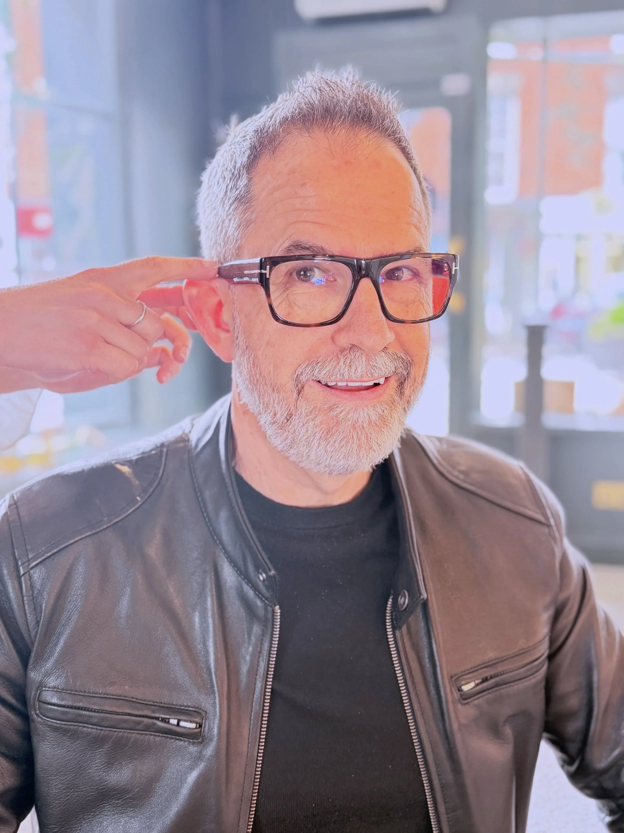 Male customer having Tom Ford Glasses fitted by Victoria Jane