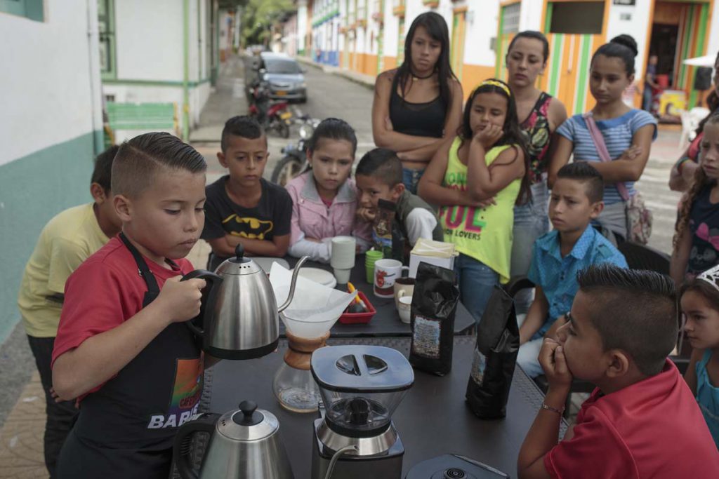 Julián Rosas teaches other children from Marsella’s troubled areas how to brew filter coffee, a skill he learned in the “Cafeteritos de Marsella” program of the Marsella Juega y Educa Foundation. Created by Spanish architect Javier Sánchez, the prog…