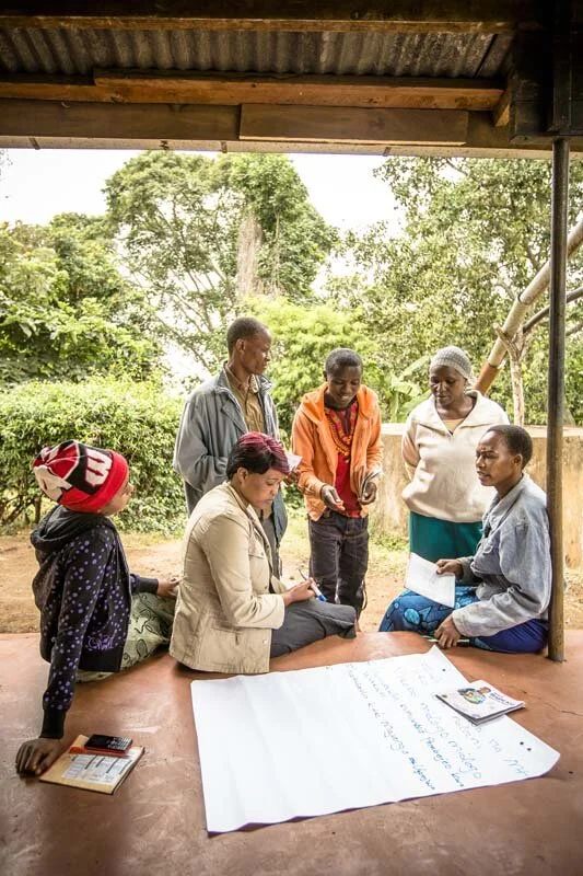 The Mareu Youth Group in the Arumeru district of Tanzania’s Arush region brainstorming reasons why Internal Savings would benefit their producer organization. Pictured: Tumaini Nassary, Godwin Mmassy, Raphael Nikolo, Gladness Mafie, Neema J Pallagyo…