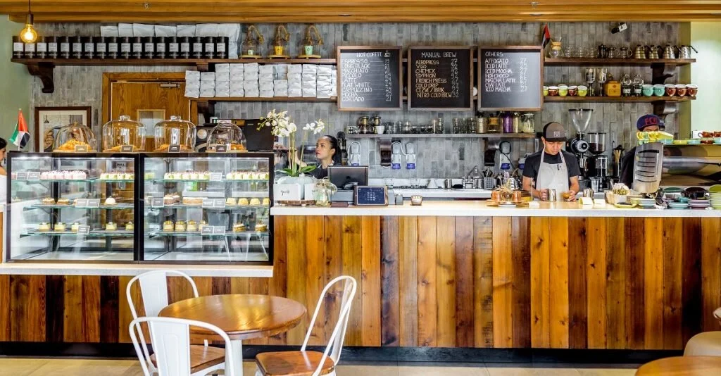 One of the first specialty coffee shops to open in Abu Dhabi, Joud Café offers locals a comfortable, yet lively and sophisticated, atmosphere in which to socialize over coffee. (Credit: Joud Café.)