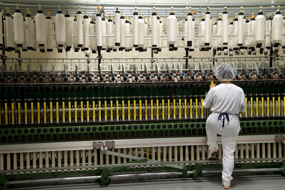 Cotton is spun into yarn at a local factory in North Carolina.