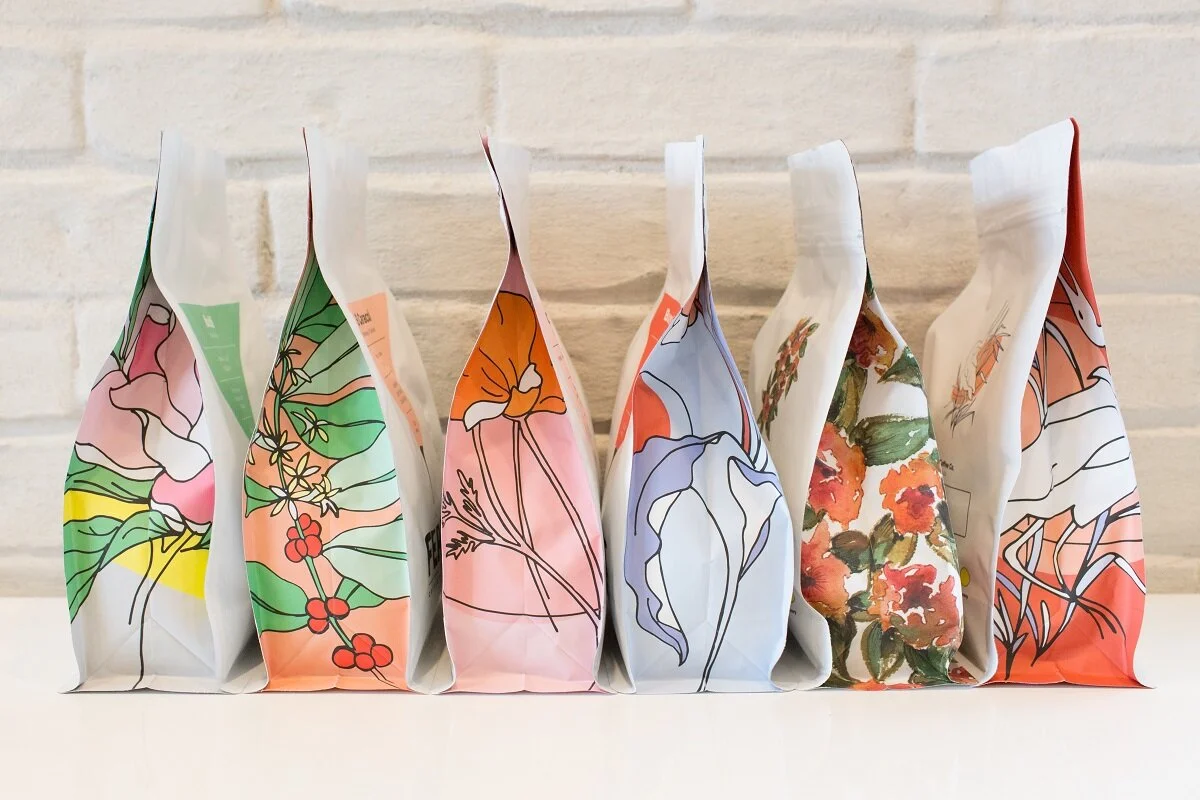 Feast Coffee &amp; Culture applies unrelated illustration on the sides of their bags to bring additional beauty to the coffee brewing experience.
