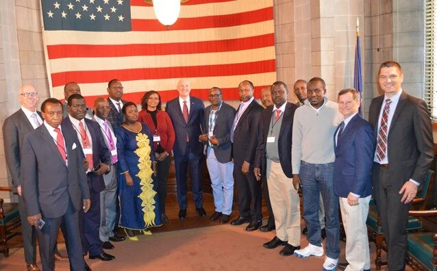 A Kenya government delegation meets with Nebraska Governor Pete Ricketts during the first Nebraska Coffee Symposium hosted by Zabuni.