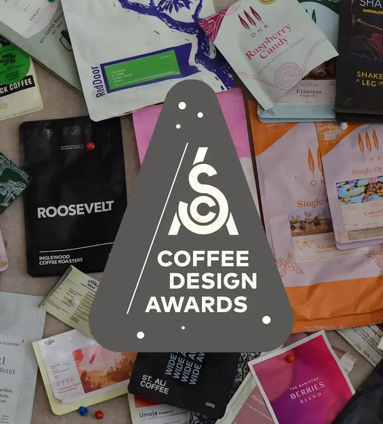 Coffee Design Awards logo on top of an image of several coffee bags lying flat