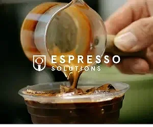 Espresso Solutions logo on top of an image of someone adding espresso to an iced drink