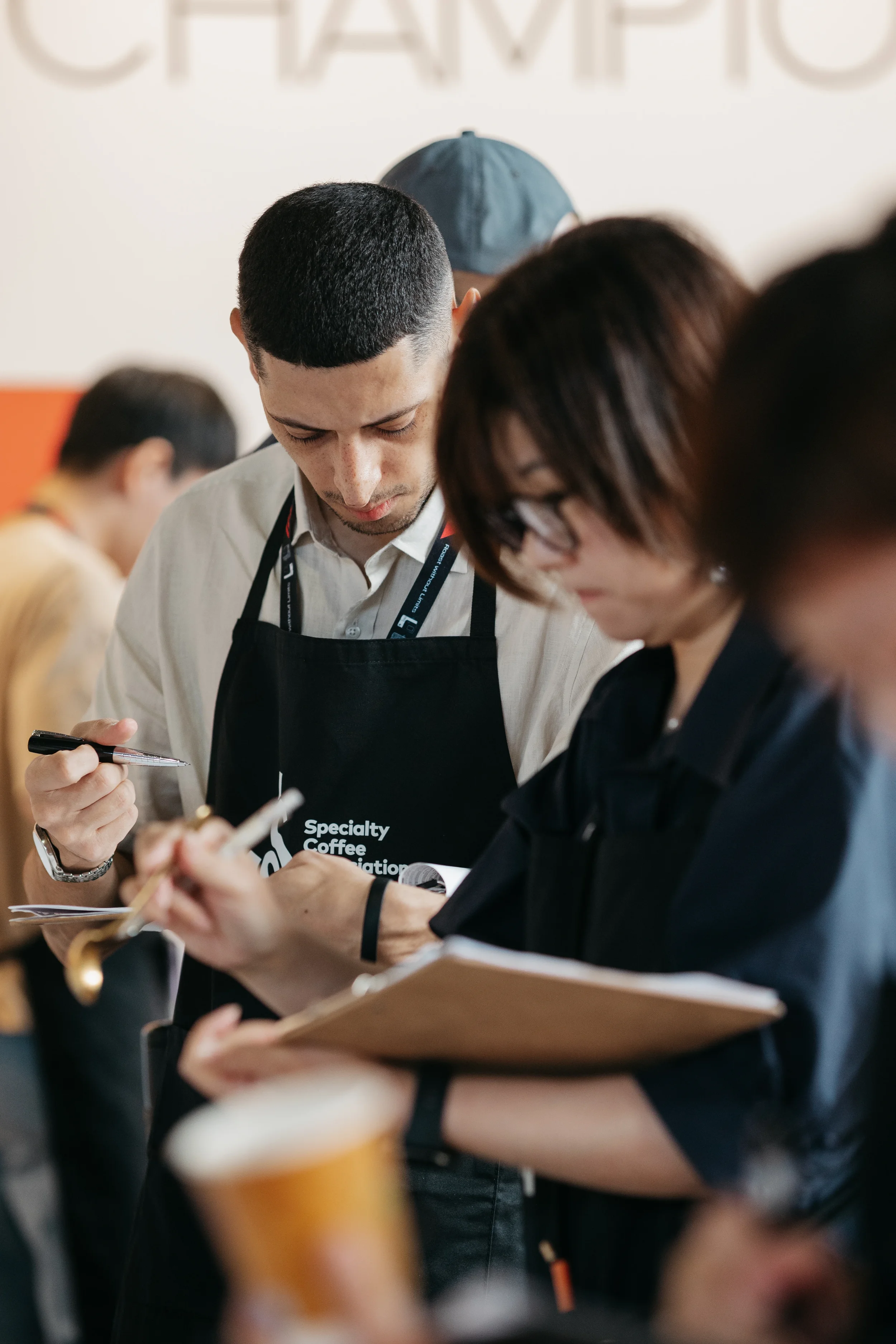 Two coffee professionals participating in a workshop