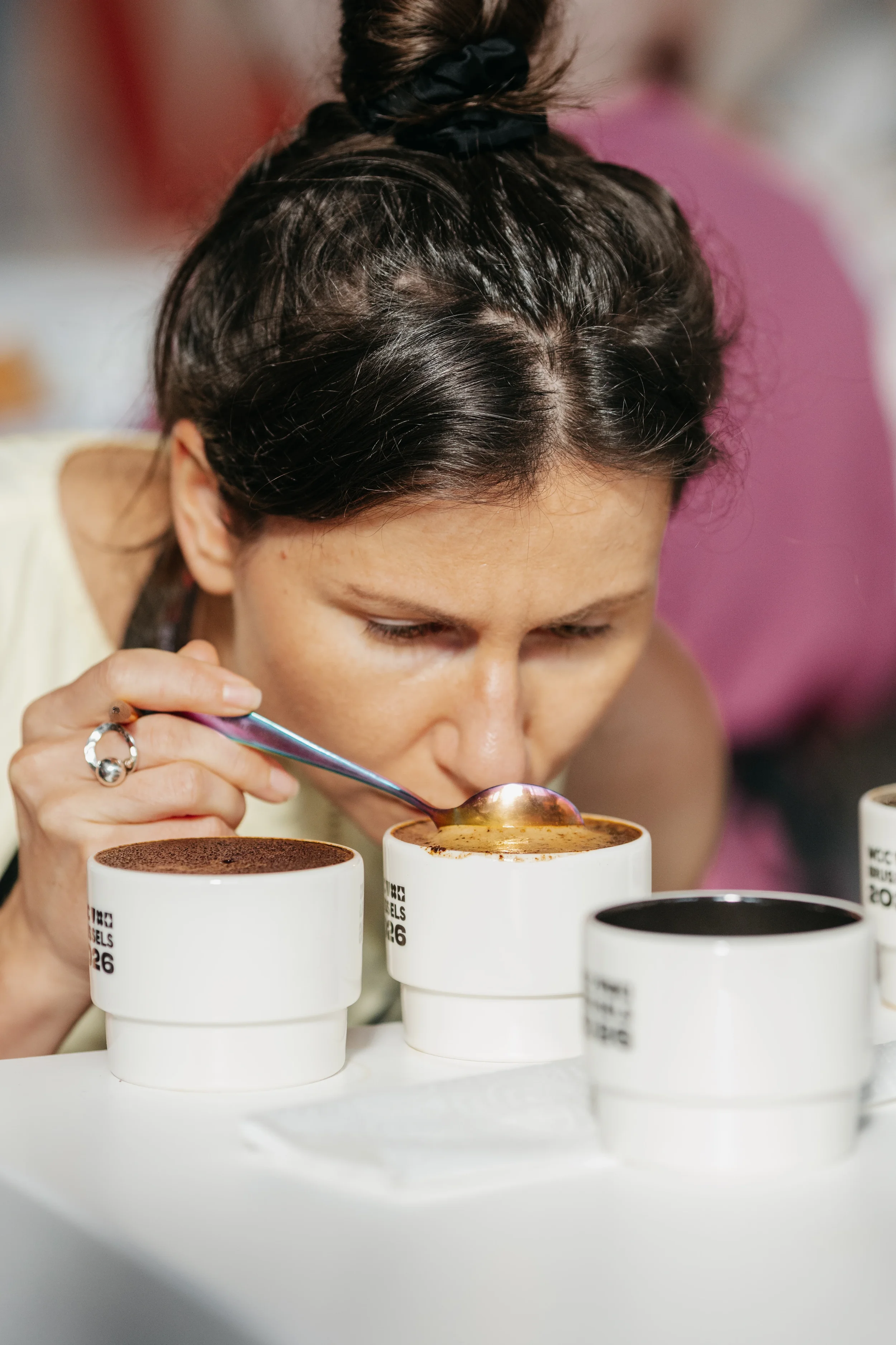 Person cupping coffee
