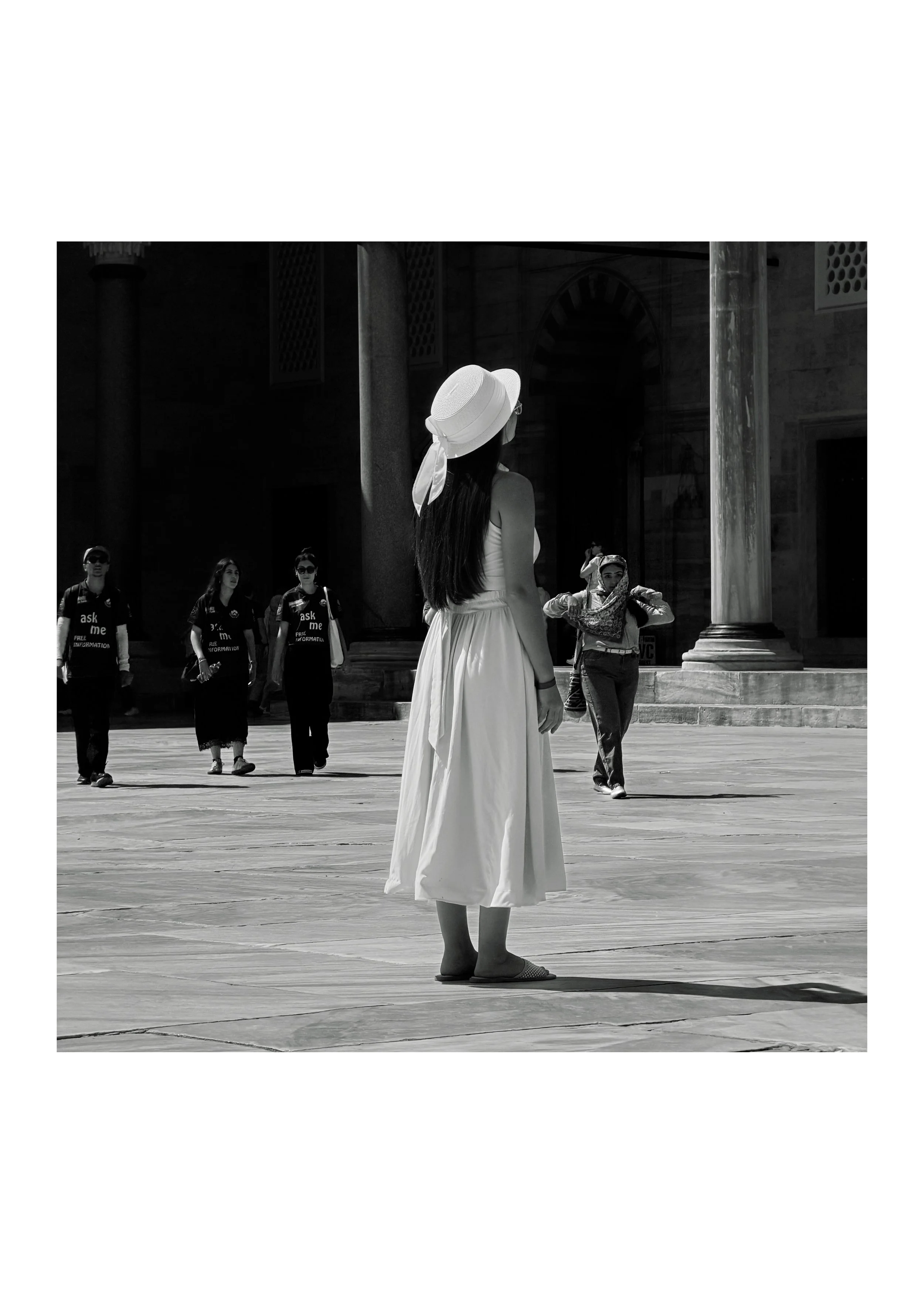 Lady standing in the main square of the Blue Mosque