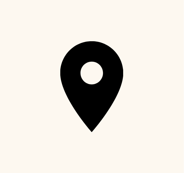 Black map location pin icon on a light background