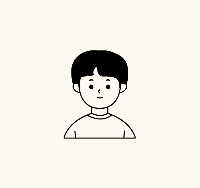 Simple cartoon of a young boy with black hair, wearing a T-shirt, smiling gently.