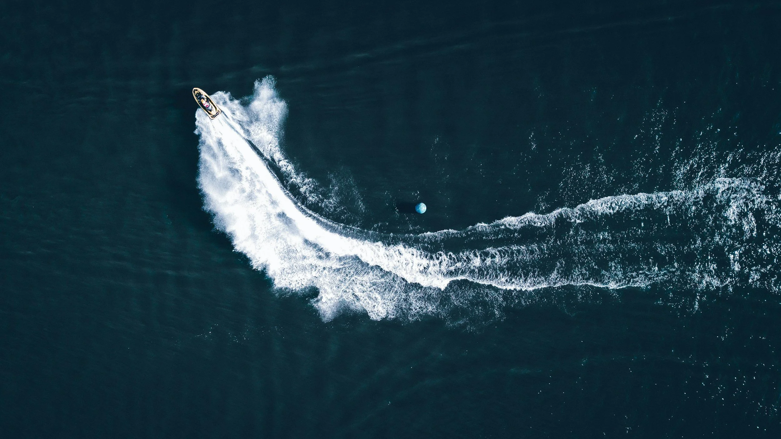 Aerial view of a jet ski on a large Muskoka lake