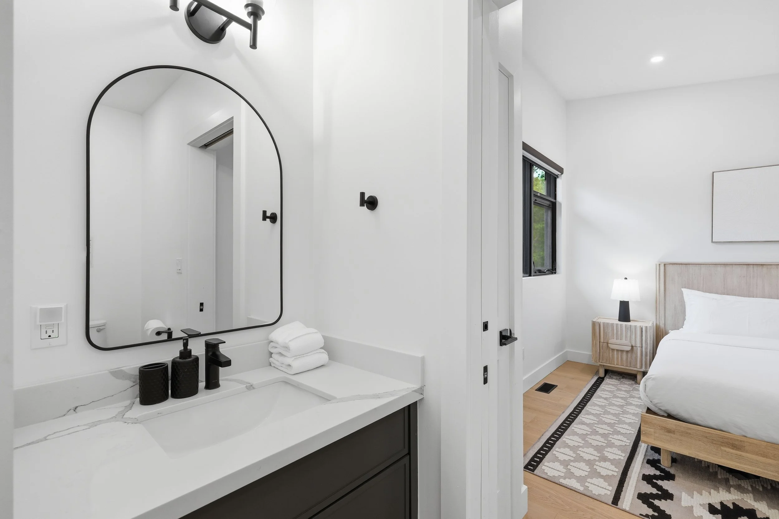 modern bathroom with mirror and sink at luxury Muskoka cottage