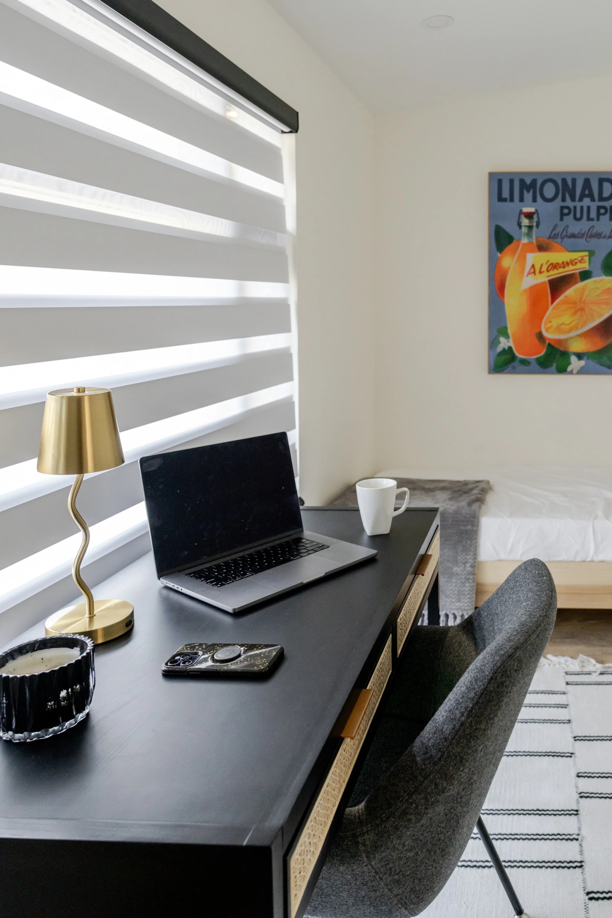 dual bedroom and office with a work area for remote work