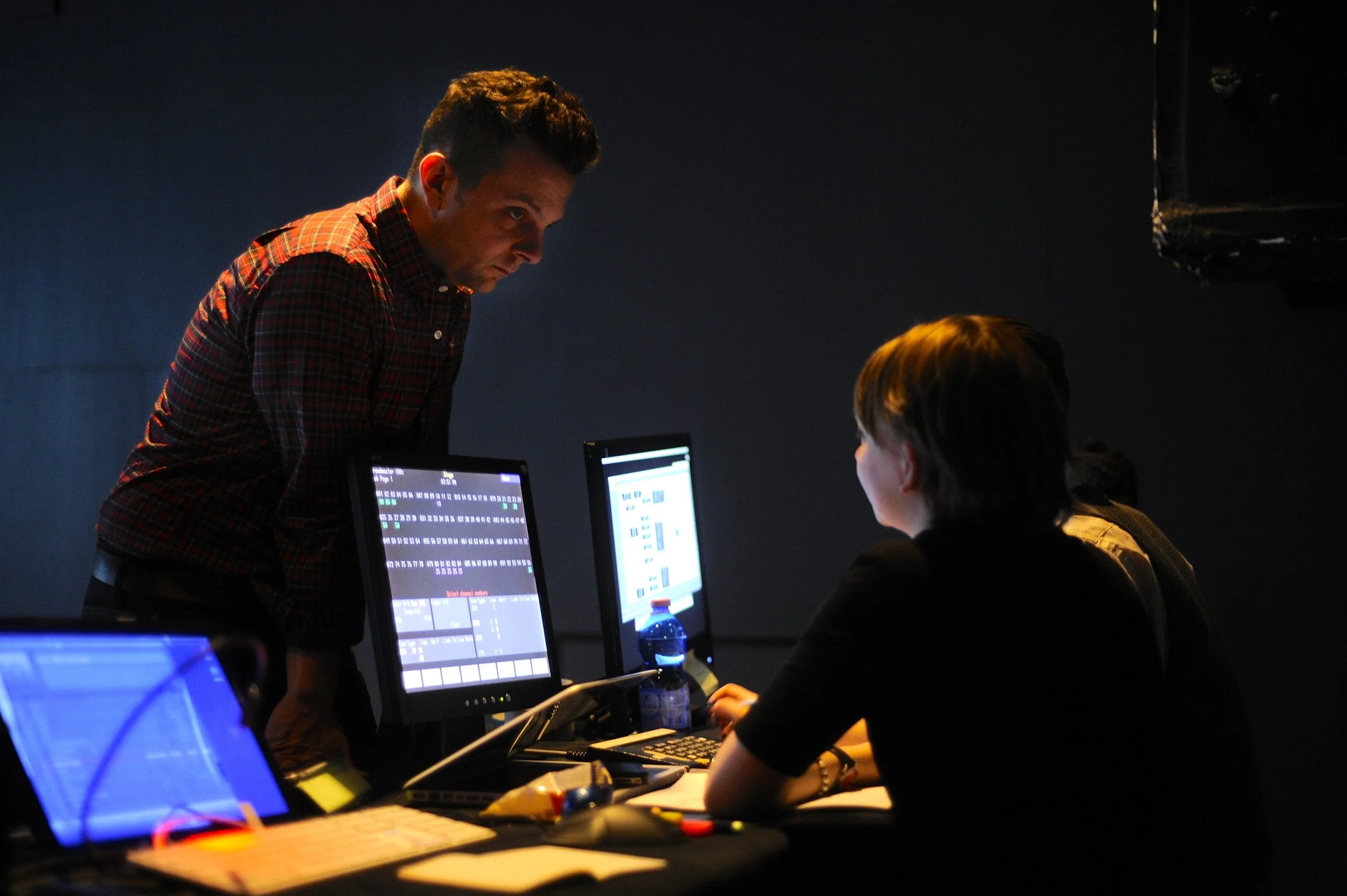 Theatre director Scott Ebersold at work during technical rehearsal