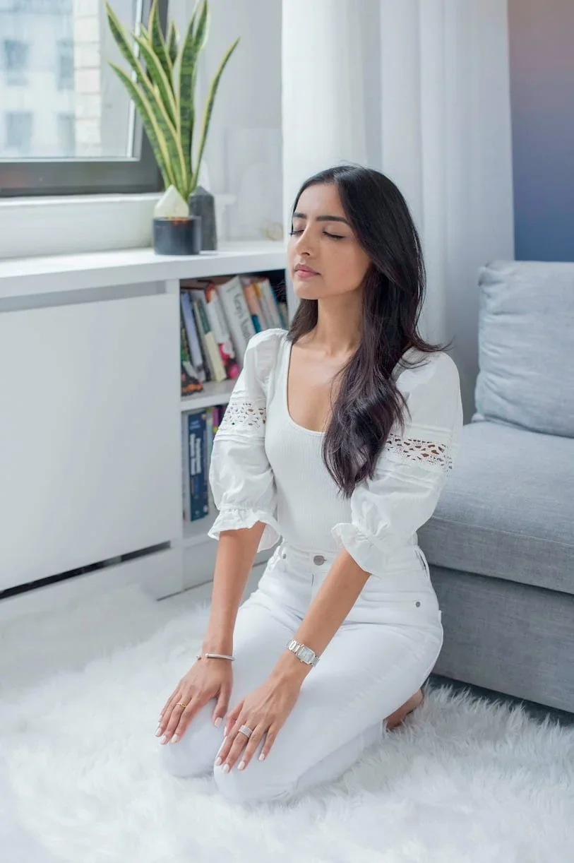 Woman In White Meditation | Exhausted by your anxiety? Start therapy with Repose today | 10001 | 10009 | 10003 | 10004