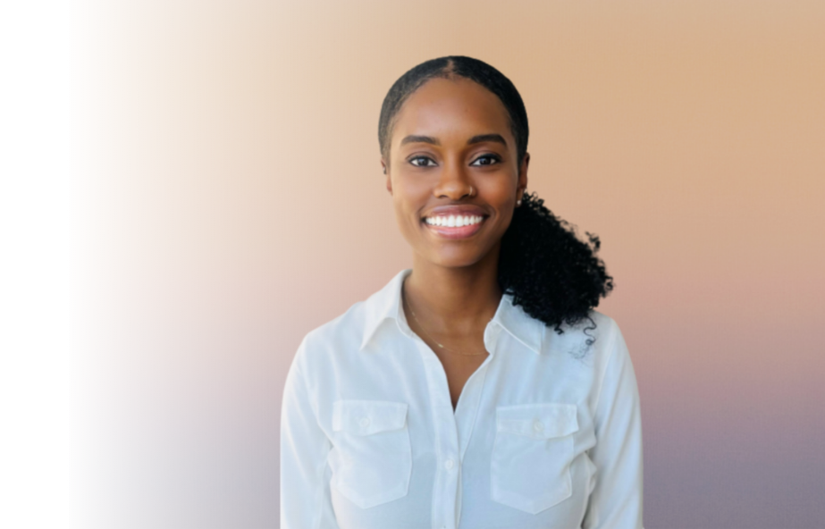 A smiling Black woman with braided hair in a ponytail, wearing a white button-up shirt, with a beige gradient background.
