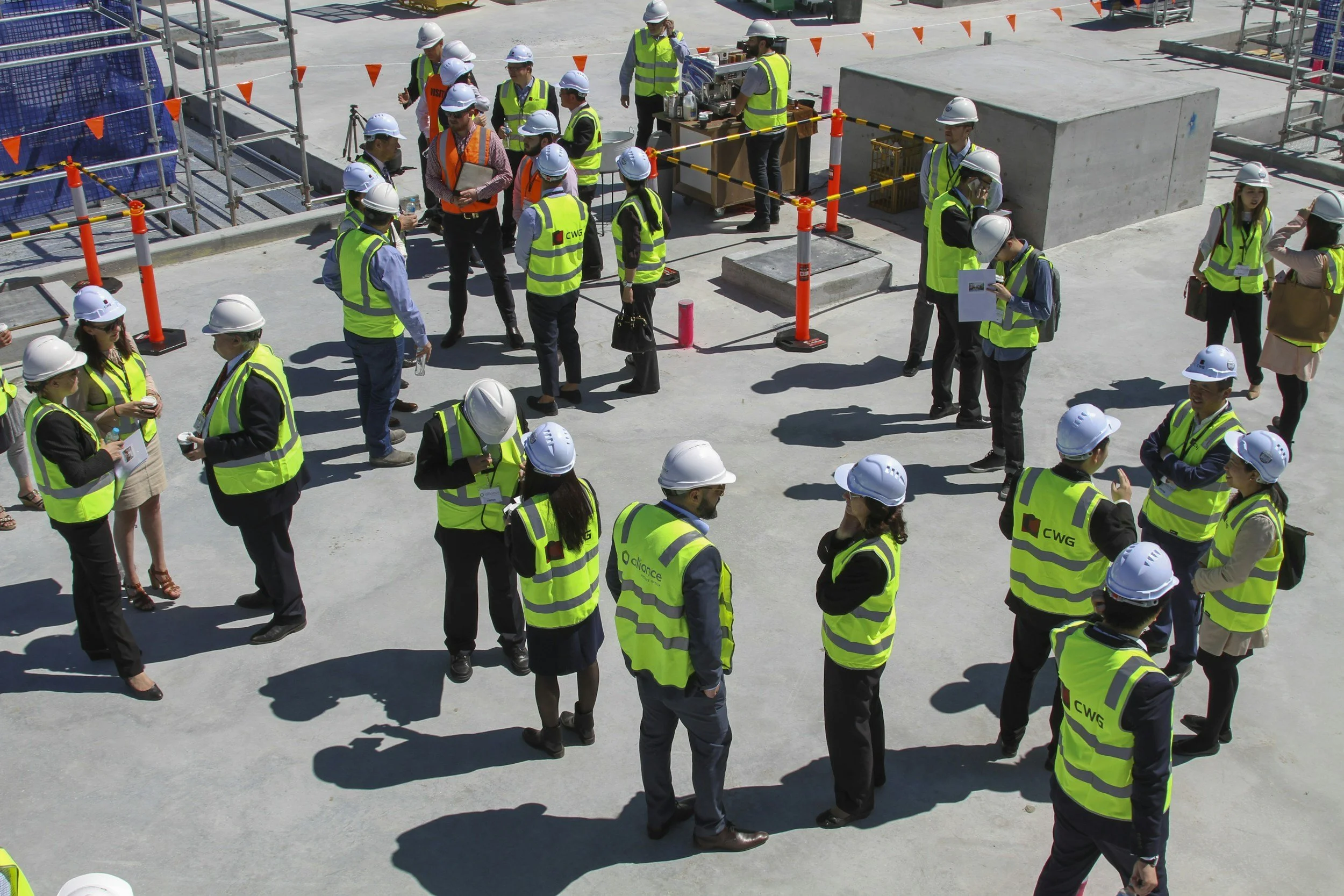 Safety meeting with workers on site during OSHA training and jobsite safety discussion.