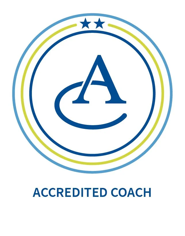 Logo with the letter A and a stylized golf club, three stars at the top, and the words "ACCREDITED COACH" below.