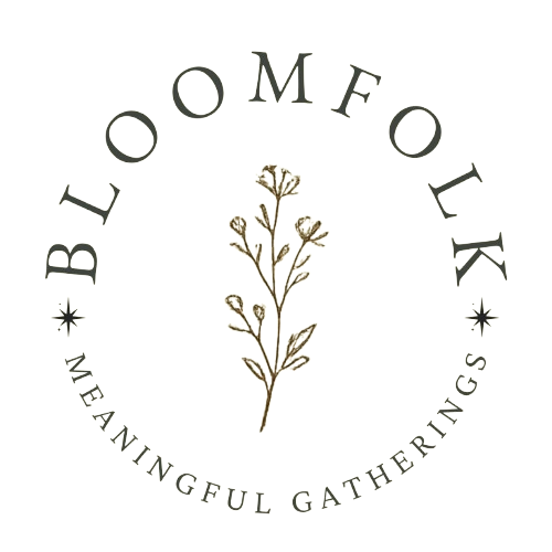 Logo with the text 'BLOOMFOLK' and 'MEANINGFUL GATHERINGS' surrounding a botanical illustration of a flowering plant.