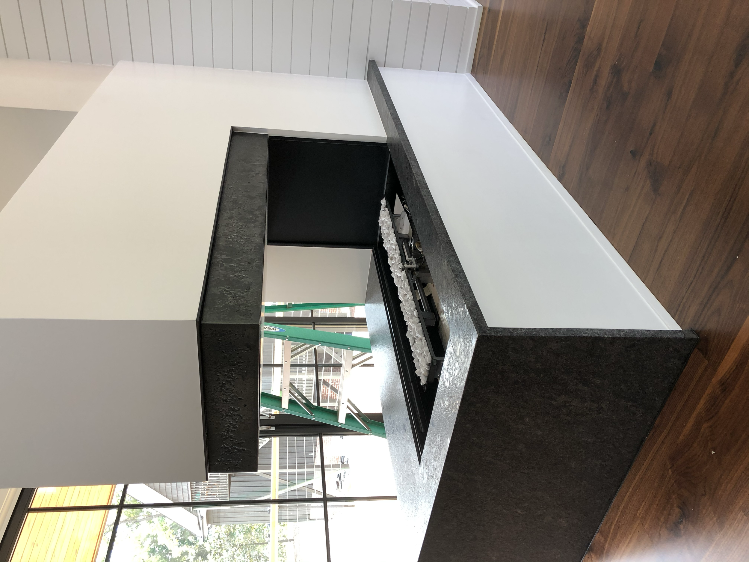 fire box surround with hot worked texture • Storybook - design • Don Tice - architect