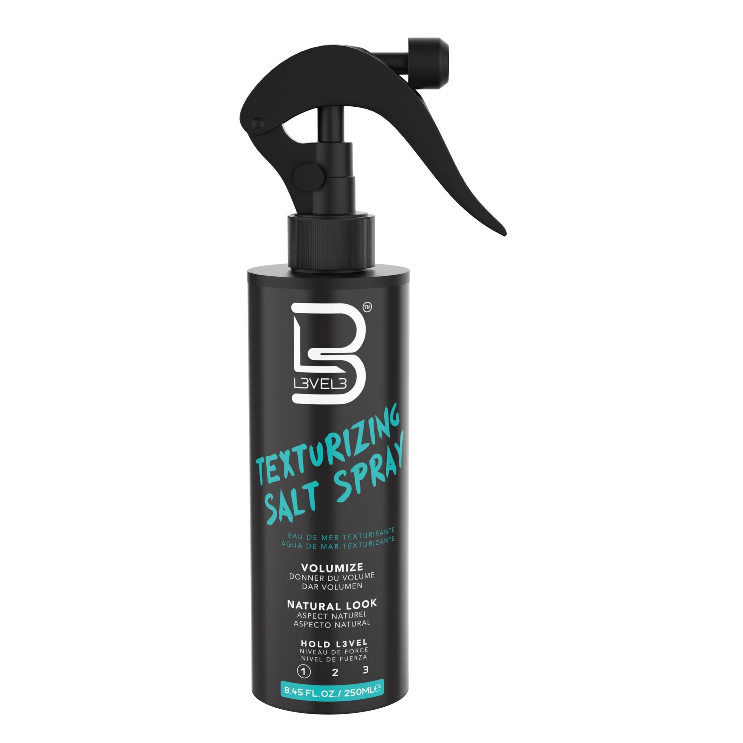 A black spray bottle labeled 'Texturizing Salt Spray' with text in multiple languages and instructions for use, indicating it is 8.45 fl oz or 250 mL.