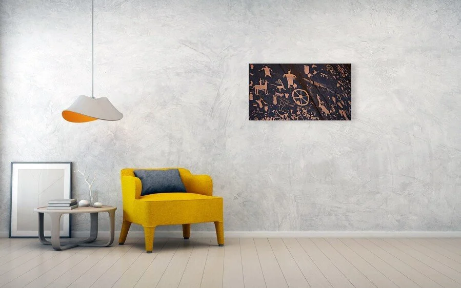 Before the Alphabet fine art print displayed above a yellow chair and small table