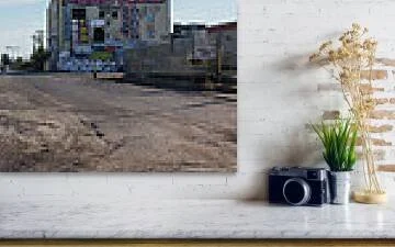 Edge of the Yard, close-up detail of the fine art print above a marble ledge with a camera and a plant